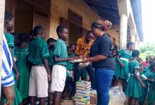 Former Student Donates Exercise Books to Pupils of Old Offinso RC Primary School