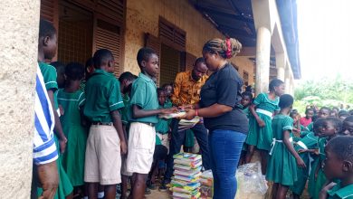 Former Student Donates Exercise Books to Pupils of Old Offinso RC Primary School
